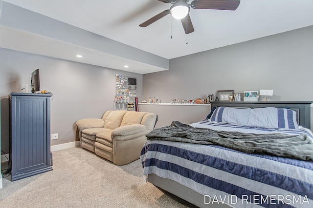 bedroom with ceiling fan and light colored carpet