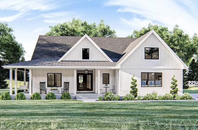 modern inspired farmhouse featuring covered porch and a front lawn