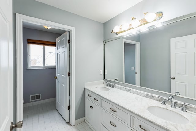 bathroom featuring vanity