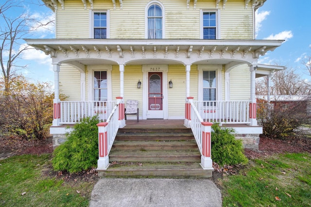 italianate-style house with a porch