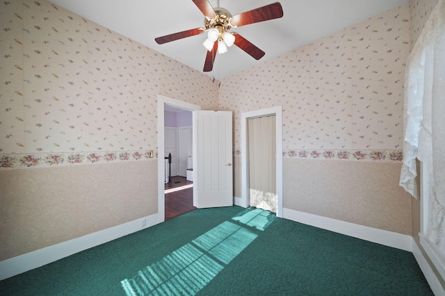 carpeted empty room with ceiling fan