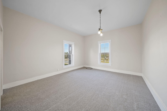 empty room with carpet flooring