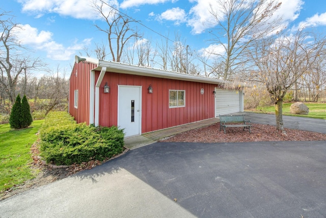 view of outdoor structure with a garage