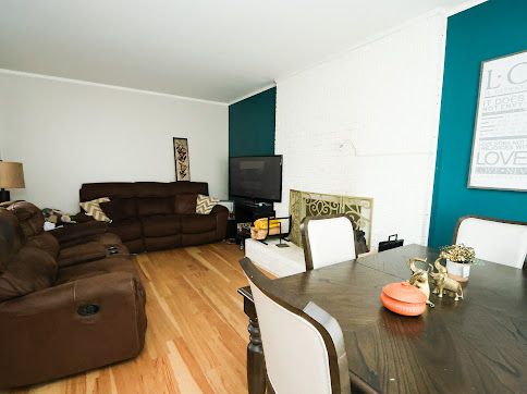 dining space with hardwood / wood-style floors