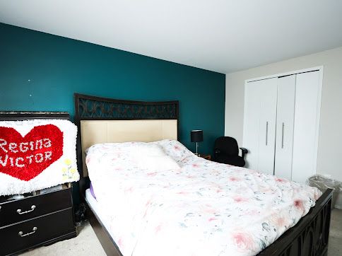 bedroom with carpet floors and a closet