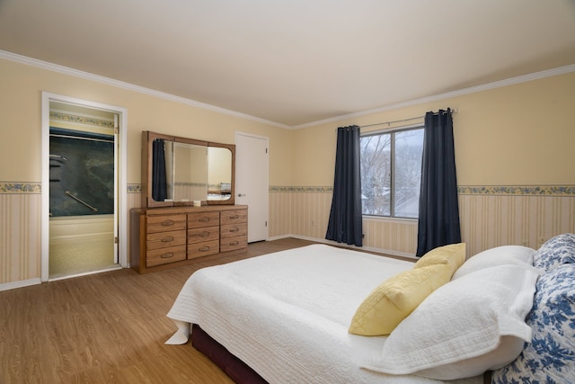 bedroom with crown molding and wood-type flooring