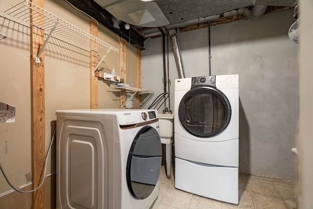 washroom featuring separate washer and dryer