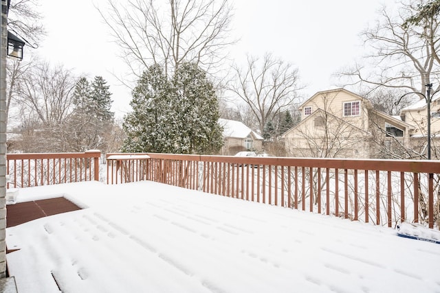 view of snow covered deck