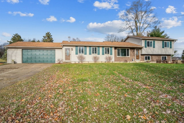 view of front of home featuring a front lawn and a garage