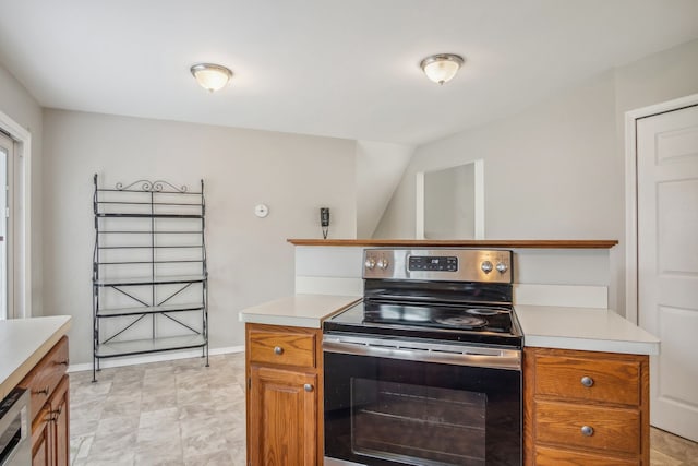 kitchen with dishwasher and electric stove