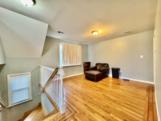 sitting room featuring wood-type flooring