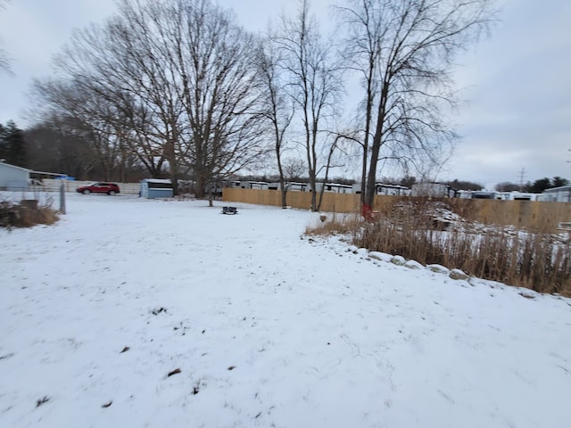 view of yard covered in snow