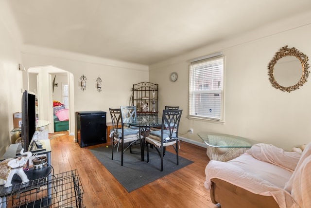 dining area with hardwood / wood-style flooring