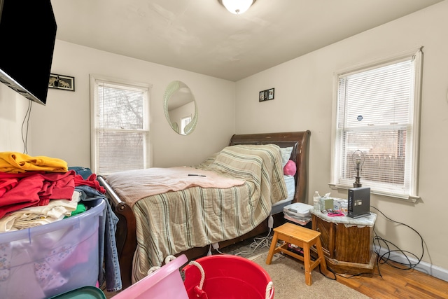 bedroom featuring hardwood / wood-style floors