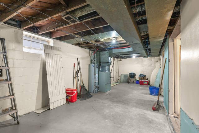 basement with heating unit and gas water heater