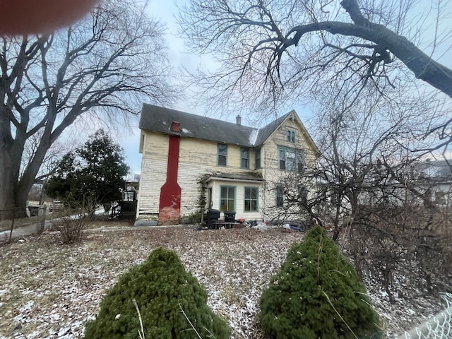 view of snow covered property