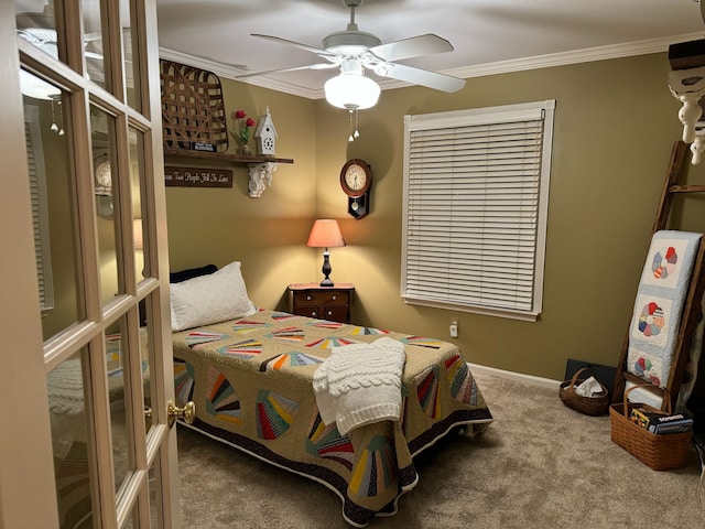 bedroom featuring ceiling fan, carpet, and ornamental molding