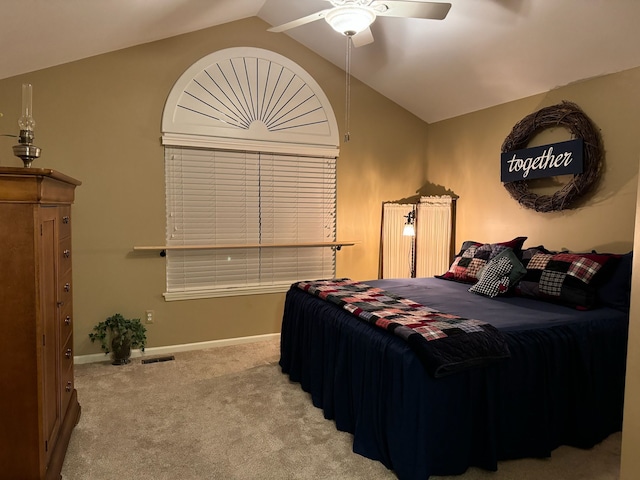 bedroom featuring ceiling fan, carpet, and lofted ceiling