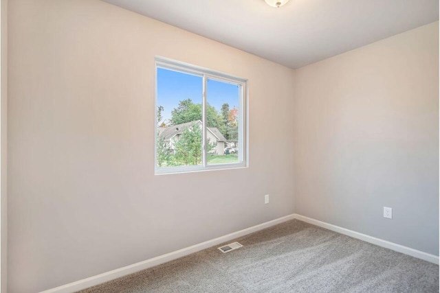 spare room with carpet flooring