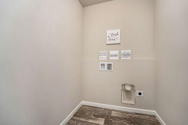 laundry room featuring hookup for an electric dryer, washer hookup, and dark wood-type flooring