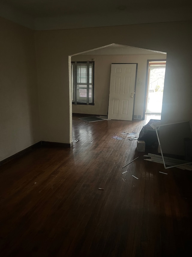 foyer featuring dark wood-type flooring