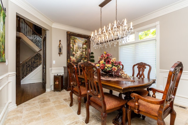 dining space with crown molding