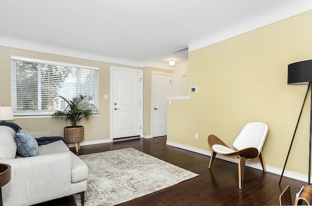 living room featuring dark hardwood / wood-style floors