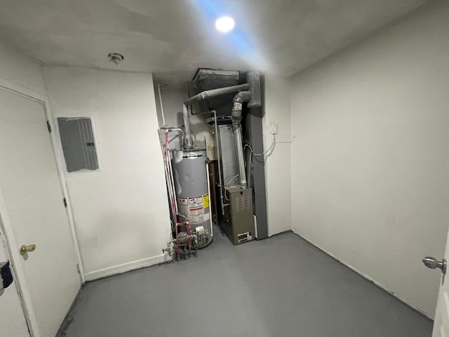 utility room with electric panel, heating unit, and gas water heater