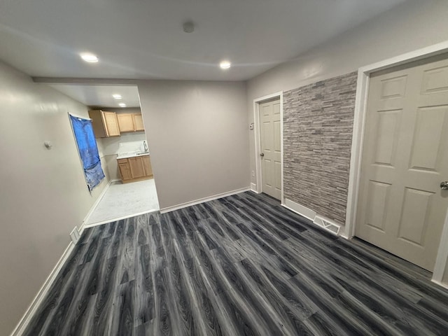 interior space featuring dark wood-type flooring