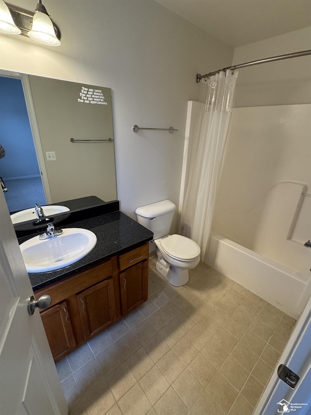 full bathroom with vanity, toilet, and shower / bath combo with shower curtain