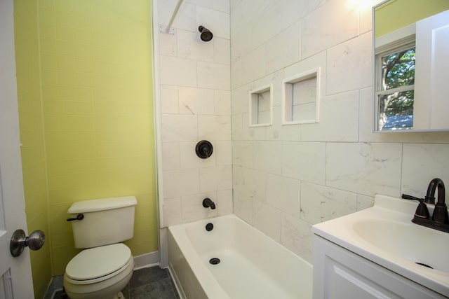 full bathroom with tile patterned floors, vanity, toilet, and tiled shower / bath