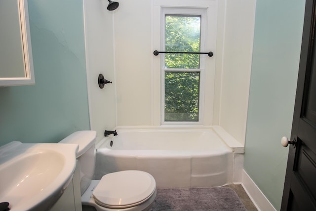 bathroom featuring toilet and sink