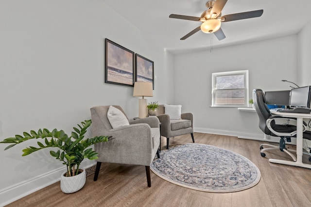 office space with ceiling fan and hardwood / wood-style floors