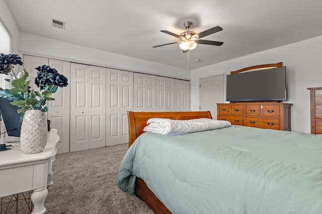 carpeted bedroom featuring ceiling fan