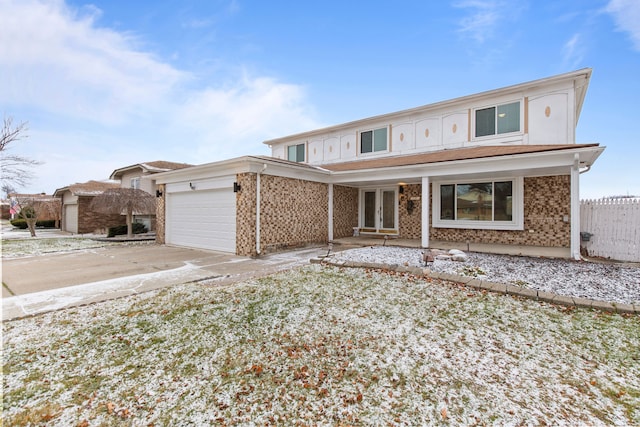 front of property with a garage