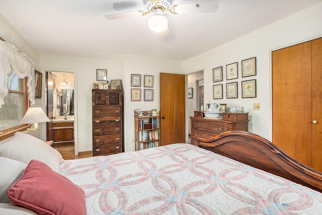 bedroom featuring ensuite bathroom, ceiling fan, and sink