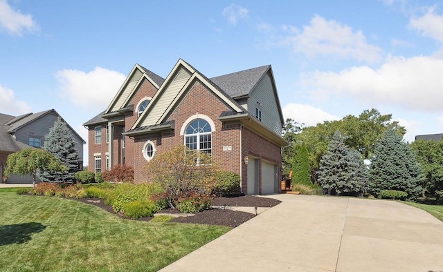 front facade featuring a front yard and a garage