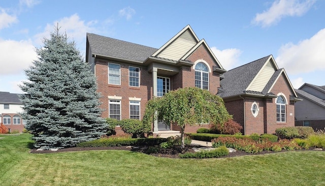 front of property featuring a front lawn