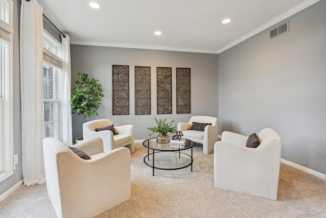 living room with crown molding and light carpet