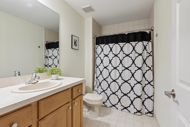 bathroom featuring tile patterned floors, walk in shower, vanity, and toilet