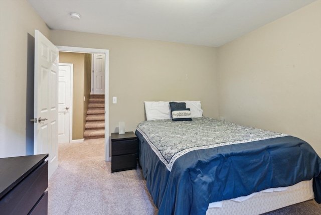 bedroom featuring carpet