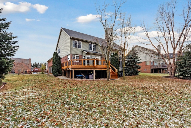 rear view of property featuring a deck