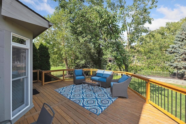 wooden deck featuring outdoor lounge area