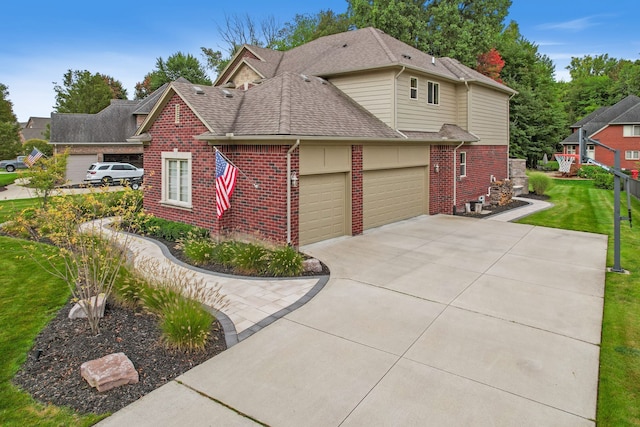 view of home's exterior with a lawn and a garage