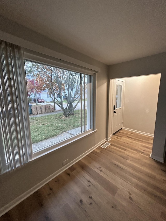 empty room with light wood-type flooring