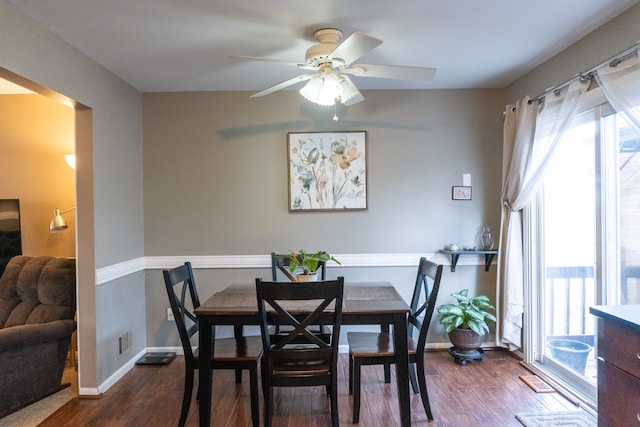 dining space featuring ceiling fan, plenty of natural light, and dark hardwood / wood-style floors