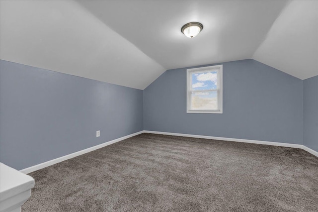 bonus room featuring carpet and lofted ceiling