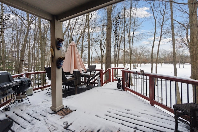 view of snow covered deck