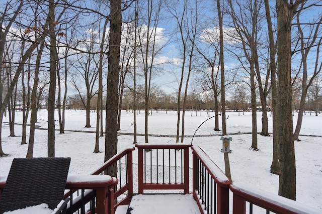 view of snow covered deck