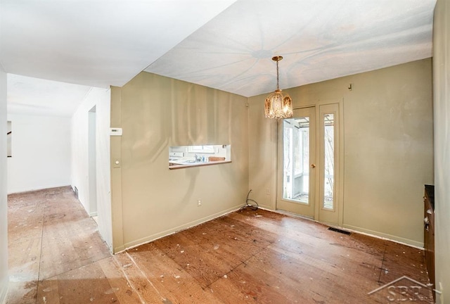 interior space with visible vents and an inviting chandelier